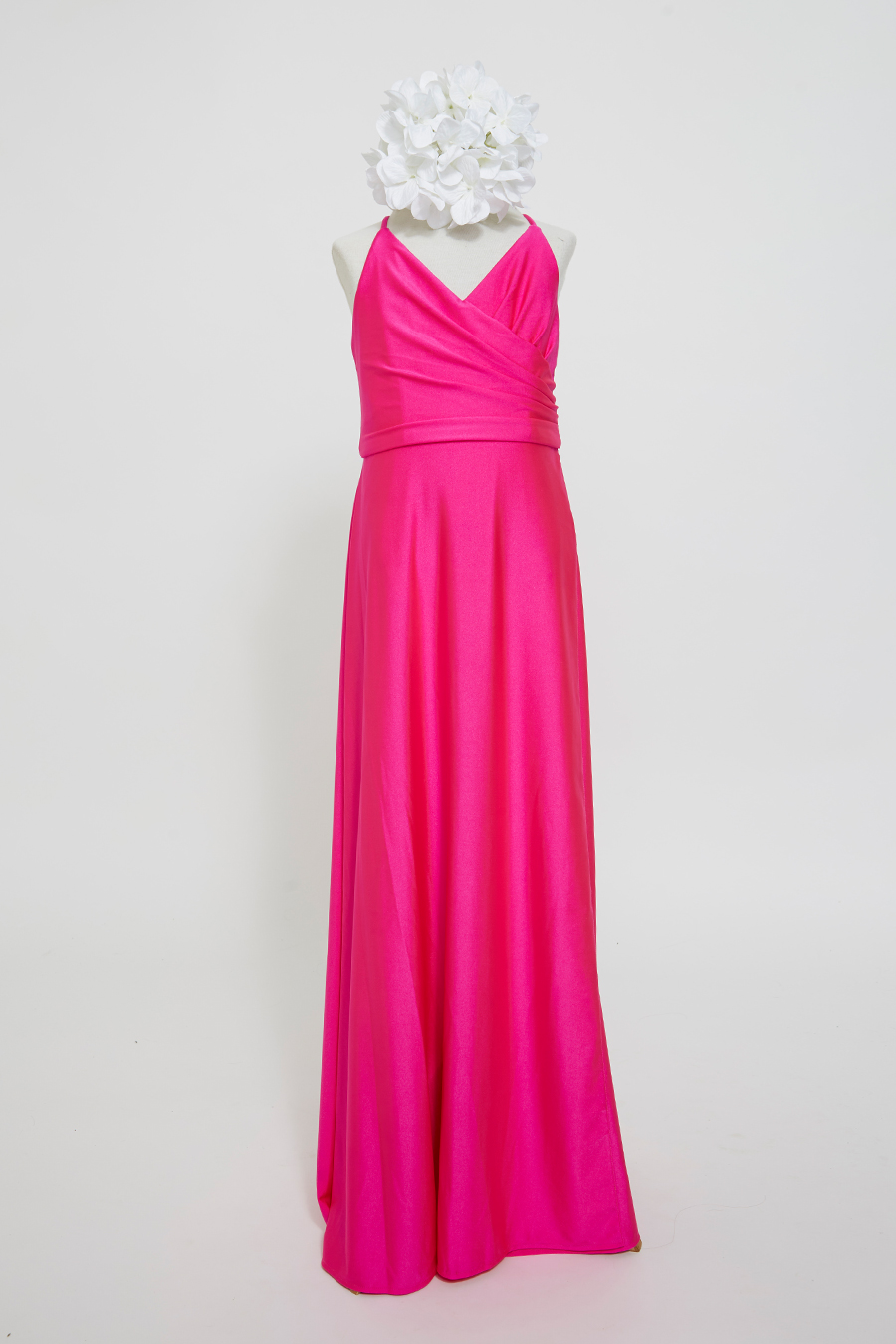 Front view junior bridesmaid dress with faux-wrap ball gown skirt